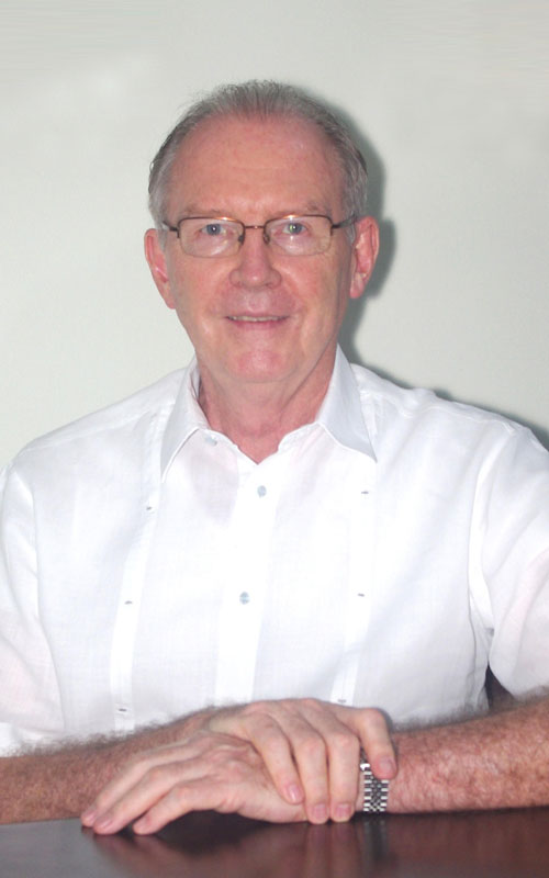 DENIS H. NIXON, Chairman of the Board